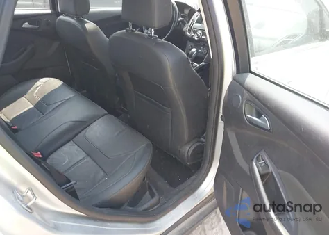 2015 Ford Focus Titanium z USA, uszkodzony, nr VIN 1FADP3J24FL280341